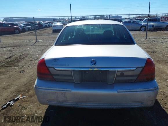 2006 Mercury Grand Marquis LS Premium z VIN 2MEHM75W56X605511, wystawiony jako IAAI lot #41642522 z przebiegiem 120 054 mil mil oraz . Historia ofert i sprzedaży dostępna na DreamBid. Obrazek 16.