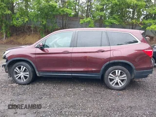 2016 Honda Pilot EX-L with VIN 5FNYF6H5XGB007876, listed as a IAAI auction lot 42366901 with 128,580 mi miles and . Bid and sale history available at DreamBid. Image 14.