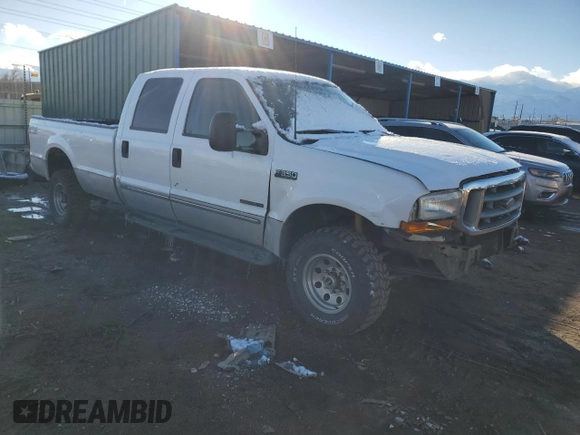 2000 Ford F-350 XL with VIN 1FTSW31F8YEA82117, listed as a Copart auction lot 82800154 with 236,161 mi miles and Salvage Title. Bid and sale history available at DreamBid. Image 4.