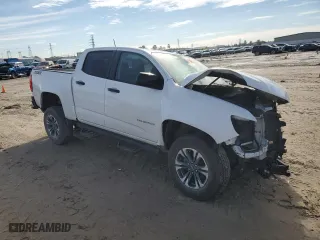 2021 Chevrolet Colorado 2WD Z71 with VIN 1GCGSDEN1M1200745, listed as a Copart auction lot 87751735 with 44,863 mi miles and Salvage Title. Bid and sale history available at carsss.com. Image 4.