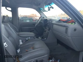 2004 GMC Yukon Denali z VIN 1GKEK63UX4J280662, wystawiony jako IAAI lot #40847473 z przebiegiem 95 677 mil mil oraz . Historia ofert i sprzedaży dostępna na DreamBid. Obrazek 5.