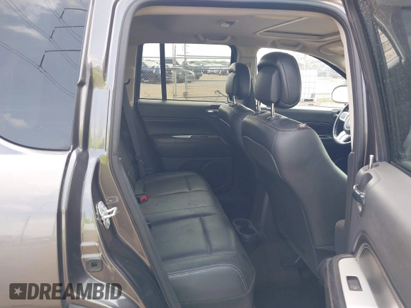 2016 Jeep Compass High Altitude Edition with VIN 1C4NJCEA1GD720223, listed as a IAAI auction lot 41879625 with 147,458 mi miles. Bid and sale history available at carsss.com. Image 8.