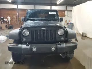 2014 Jeep Wrangler Sport with VIN 1C4AJWAG5EL307945, listed as a Copart auction lot 60152035 with 119,508 mi miles and Salvage title. Bid and sale history available at DreamBid. Image 5.