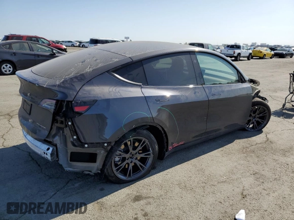 2024 Tesla Model Y Long Range с VIN 7SAYGDEE8RF184146, выставлен на аукционе Copart как лот 61194535 с пробегом 8 225 миль миль и Списание • Salvage title. История ставок и продаж доступна на DreamBid. Изображение 3.