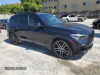 2020 BMW X5 M50i with VIN 5UXJU4C00L9C54563, listed as a Copart auction lot 56119764 with 65,963 mi miles. Bid and sale history available at carsss.com. Image 4.