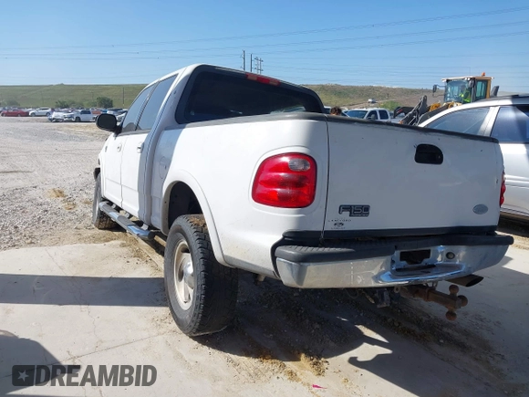 2003 Ford F-150 XLT with VIN 1FTRW08L63KA28964, listed as a IAAI auction lot 41689700 with 303,789 mi miles. Bid and sale history available at carsss.com. Image 3.