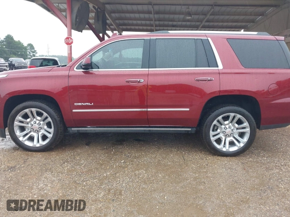 2020 GMC Yukon Denali with VIN 1GKS2CKJ5LR129592, listed as a IAAI auction lot 39806304 with 71,125 mi miles. Bid and sale history available at carsss.com. Image 14.
