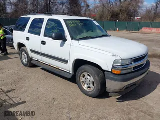 2005 Chevrolet Tahoe LS with VIN 1GNEK13T65J198121, listed as a IAAI auction lot 41826459 with 233,718 mi miles. Bid and sale history available at carsss.com. Image 1.