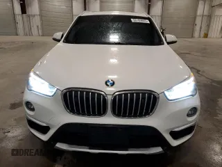 2018 BMW X1 xDrive28i with VIN WBXHT3C30J5K29917, listed as a Copart auction lot 56165845 with 131,876 mi miles and Salvage title. Bid and sale history available at DreamBid. Image 5.