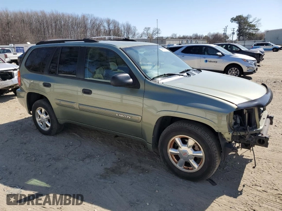 2004 GMC Envoy SLE with VIN 1GKDS13S542324252, listed as a Copart auction lot 48667895 with 206,206 mi miles and Salvage Title. Bid and sale history available at carsss.com. Image 4.