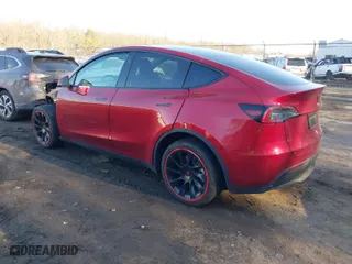 2024 Tesla Model Y Long Range with VIN 7SAYGDEEXRA264447, listed as a IAAI auction lot 41667885 with 16,167 mi miles. Bid and sale history available at carsss.com. Image 3.
