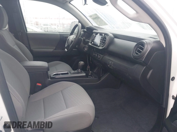 2023 Toyota Tacoma SR z VIN 3TYRZ5CN1PT037202, wystawiony jako IAAI lot #41896502 z przebiegiem 45 568 mil mil oraz . Historia ofert i sprzedaży dostępna na DreamBid. Obrazek 5.