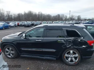 2013 Jeep Grand Cherokee Limited with VIN 1C4RJFBT9DC592257, listed as a IAAI auction lot 40955180 with 130,038 mi miles. Bid and sale history available at carsss.com. Image 14.