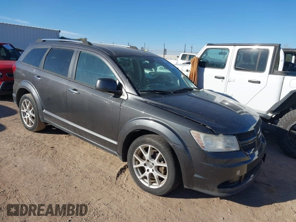 2014 Dodge Journey Limited with VIN 3C4PDDDG2ET175023, listed as a IAAI auction lot 41646669 with 112,663 mi miles and . Bid and sale history available at carsss.com. Image 1.