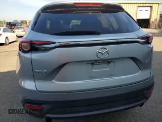 2018 Mazda CX-9 Touring z VIN JM3TCACY4J0219449, wystawiony jako Copart lot #61949725 z przebiegiem 134 904 mil mil oraz Czysty tytuł • Clean title. Historia ofert i sprzedaży dostępna na DreamBid. Obrazek 6.