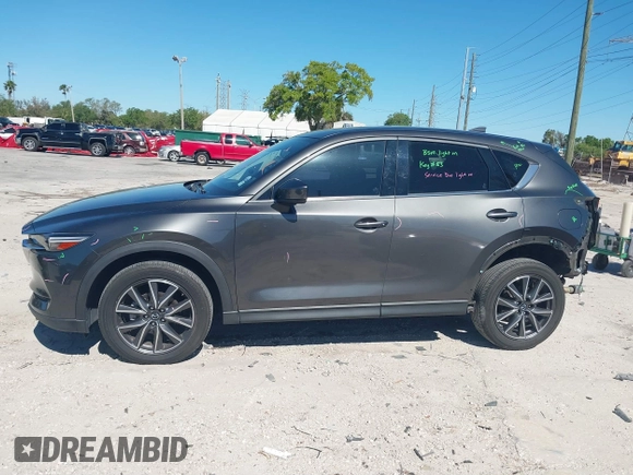 2018 Mazda CX-5 Grand Touring with VIN JM3KFBDM8J0314925, listed as a IAAI auction lot 41825917 with 70,027 mi miles. Bid and sale history available at carsss.com. Image 15.