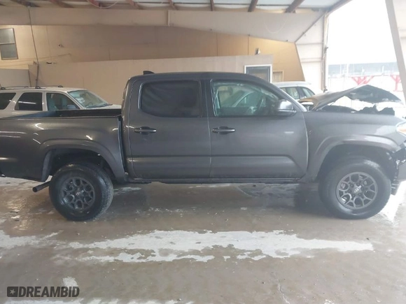 2023 Toyota Tacoma 2WD SR with VIN 3TYAX5GN3PT070361, listed as a IAAI auction lot 41524917 with 27,124 mi miles. Bid and sale history available at carsss.com. Image 13.