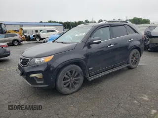 2012 Kia Sorento SX z VIN 5XYKWDA21CG213651, wystawiony jako Copart lot #60831745 z przebiegiem 227 817 mil mil oraz Czysty tytuł • Clean title. Historia ofert i sprzedaży dostępna na DreamBid. Obrazek 1.