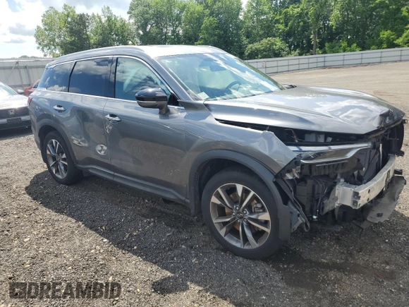 2023 Infiniti QX60 Luxe with VIN 5N1DL1FS2PC370426, listed as a Copart auction lot 57087685 with 14,344 mi miles and Salvage title. Bid and sale history available at DreamBid. Image 4.