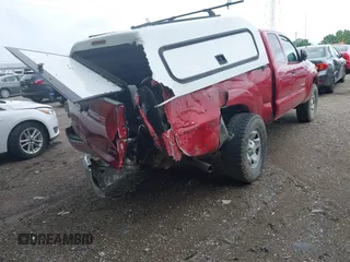 2014 Toyota Tacoma with VIN 5TFUX4EN3EX025837, listed as a IAAI auction lot 42430882 with 234,809 mi miles and . Bid and sale history available at DreamBid. Image 4.