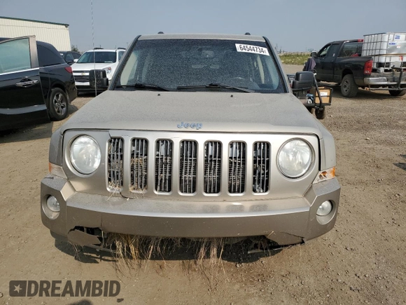 2010 Jeep Patriot Limited with VIN 1J4NF4GB8AD645342, listed as a Copart auction lot 64544734 with 244,116 mi miles and Salvage Title. Bid and sale history available at DreamBid. Image 5.