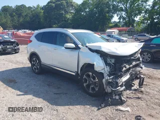 2018 Honda CR-V Touring with VIN 5J6RW2H9XJL002742, listed as a IAAI auction lot 42568940 with 106,556 mi miles and . Bid and sale history available at DreamBid. Image 1.