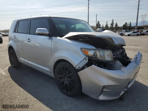 2012 Scion xB with VIN JTLZE4FE3C1143496, listed as a Copart auction lot 52157215 with 223,376 mi miles and Salvage Title. Bid and sale history available at carsss.com. Image 4.