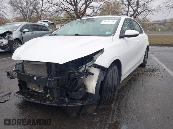 2022 Kia Forte LXS with VIN 3KPF24AD0NE455376, listed as a IAAI auction lot 41943951 with 52,535 mi miles and . Bid and sale history available at DreamBid. Image 2.