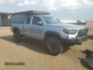 2017 Toyota Tacoma SR5 with VIN 5TFSZ5AN4HX047041, listed as a Copart auction lot 63424145 with 191,335 mi miles and Salvage title. Bid and sale history available at DreamBid. Image 4.