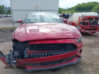 2020 Ford Mustang EcoBoost z VIN 1FA6P8TH6L5149788, wystawiony jako IAAI lot #42179624 z przebiegiem 107 520 mil mil oraz . Historia ofert i sprzedaży dostępna na DreamBid. Obrazek 12.