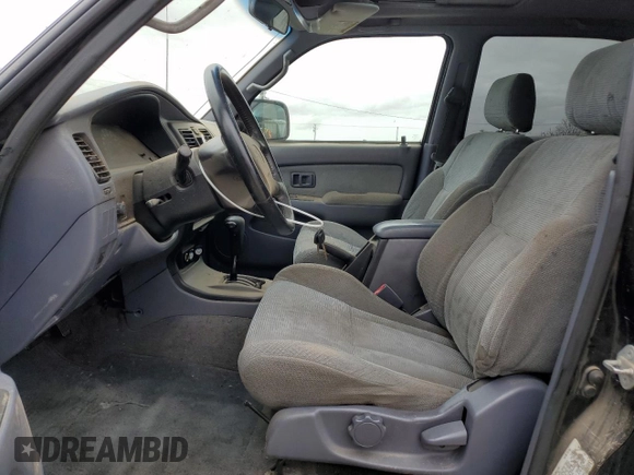 1999 Toyota 4Runner SR5 z VIN JT3GN86R0X0108623, wystawiony jako Copart lot #53191675 z przebiegiem 212 411 mil mil oraz Czysty tytuł • Clean title. Historia ofert i sprzedaży dostępna na DreamBid. Obrazek 7.