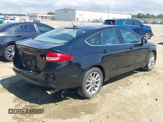 2017 Ford Fusion SE with VIN 3FA6P0H75HR391848, listed as a IAAI auction lot 40239061 with 173,515 mi miles. Bid and sale history available at carsss.com. Image 6.
