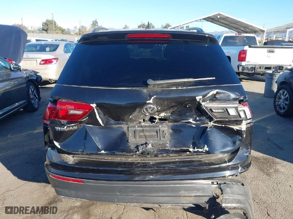 2021 Volkswagen Tiguan S with VIN 3VV1B7AX2MM051166, listed as a IAAI auction lot 41233878 with 28,690 mi miles. Bid and sale history available at carsss.com. Image 16.