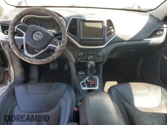 2014 Jeep Cherokee Limited z VIN 1C4PJMDB7EW173601, wystawiony jako Copart lot #61677255 z przebiegiem 180 446 mil mil oraz Szkoda całkowita • Salvage title. Historia ofert i sprzedaży dostępna na DreamBid. Obrazek 8.