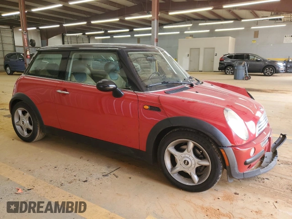 2004 MINI Hardtop with VIN WMWRC33474TJ58626, listed as a Copart auction lot 49226175 with 116,115 mi miles and Salvage Title. Bid and sale history available at DreamBid. Image 4.