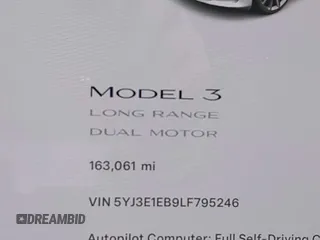 2020 Tesla Model 3 Long Range with VIN 5YJ3E1EB9LF795246, listed as a IAAI auction lot 41895750 with 163,061 mi miles and . Bid and sale history available at DreamBid. Image 16.