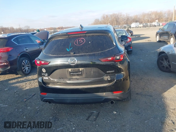 2022 Mazda CX-5 2.5 S Premium Package with VIN JM3KFBDM1N1537243, listed as a IAAI auction lot 40871911 with 77,725 mi miles. Bid and sale history available at carsss.com. Image 16.