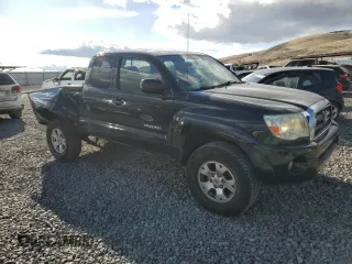 2005 Toyota Tacoma with VIN 5TEUU42N65Z037986, listed as a Copart auction lot 48816565 with 154,286 mi miles and Salvage Title. Bid and sale history available at DreamBid. Image 4.