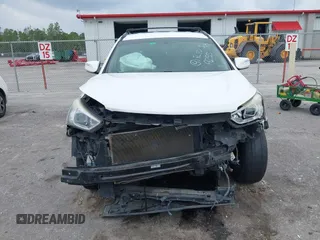 2014 Hyundai Santa Fe with VIN 5XYZU3LB9EG229255, listed as a IAAI auction lot 42407410 with 201,523 mi miles and . Bid and sale history available at DreamBid. Image 13.