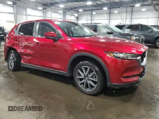2018 Mazda CX-5 Touring z VIN JM3KFBCM5J0462676, wystawiony jako Copart lot #57892015 z przebiegiem 76 566 mil mil oraz Szkoda całkowita • Salvage title. Historia ofert i sprzedaży dostępna na DreamBid. Obrazek 4.