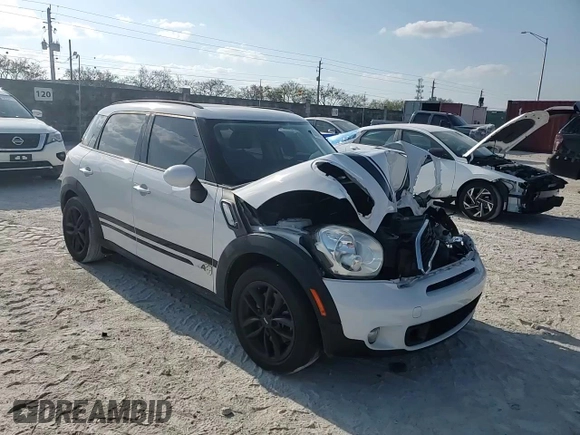 2012 MINI Countryman S with VIN WMWZC5C51CWL57074, listed as a Copart auction lot 53386715 with 55,857 mi miles and Salvage Title. Bid and sale history available at DreamBid. Image 13.