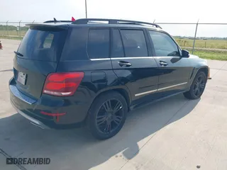 2013 Mercedes-Benz GLK-Class GLK 350 with VIN WDCGG5HB2DF990806, listed as a IAAI auction lot 42047198 with 130,728 mi miles. Bid and sale history available at carsss.com. Image 4.