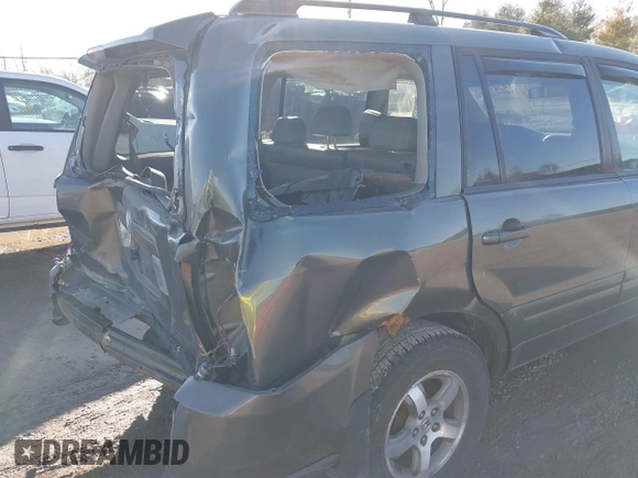 2006 Honda Pilot EX-L with VIN 5FNYF28546B002907, listed as a IAAI auction lot 41650042 with 272,069 mi miles and . Bid and sale history available at DreamBid. Image 13.