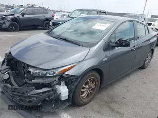 2021 Toyota Prius LE with VIN JTDKAMFP0M3193305, listed as a IAAI auction lot 42283494 with 322,523 mi miles and . Bid and sale history available at DreamBid. Image 17.
