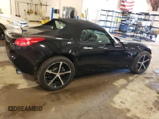 2008 Pontiac Solstice z VIN 1G2MB35B88Y123215, wystawiony jako Copart lot #56426295 z przebiegiem 30 425 mil mil oraz Czysty tytuł • Clean title. Historia ofert i sprzedaży dostępna na DreamBid. Obrazek 3.