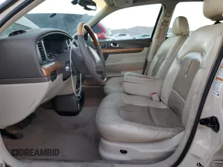 2000 Lincoln Continental with VIN 1LNHM97V0YY807253, listed as a Copart auction lot 80661834 with 130,398 mi miles and Salvage Title. Bid and sale history available at carsss.com. Image 7.