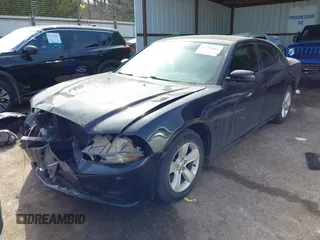 2014 Dodge Charger SE with VIN 2C3CDXBG8EH267589, listed as a IAAI auction lot 41793004 with 154,771 mi miles and . Bid and sale history available at DreamBid. Image 18.