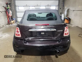 2015 MINI Convertible z VIN WMWZN3C59FT266929, wystawiony jako Copart lot #57264985 z przebiegiem 110 200 mil mil oraz Szkoda całkowita • Salvage title. Historia ofert i sprzedaży dostępna na DreamBid. Obrazek 6.