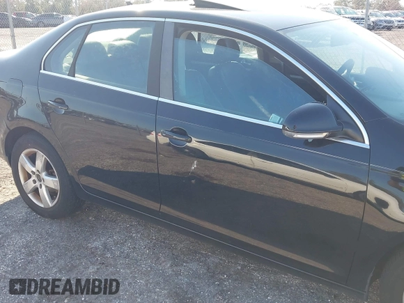 2008 Volkswagen Jetta Sedan SE with VIN 3VWRM71KX8M182235, listed as a IAAI auction lot 41519055 with 182,404 mi miles. Bid and sale history available at carsss.com. Image 12.
