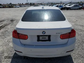 2014 BMW 3 Series 328i with VIN WBA3C1C58EK115651, listed as a Copart auction lot 59307425 with 65,902 mi miles and Salvage title. Bid and sale history available at DreamBid. Image 6.